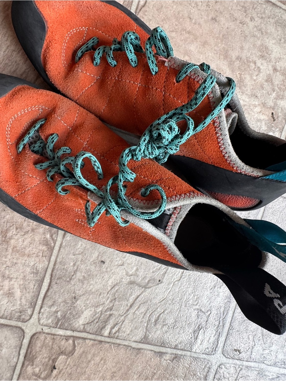 Scarpa orange and black suede climbing shoes